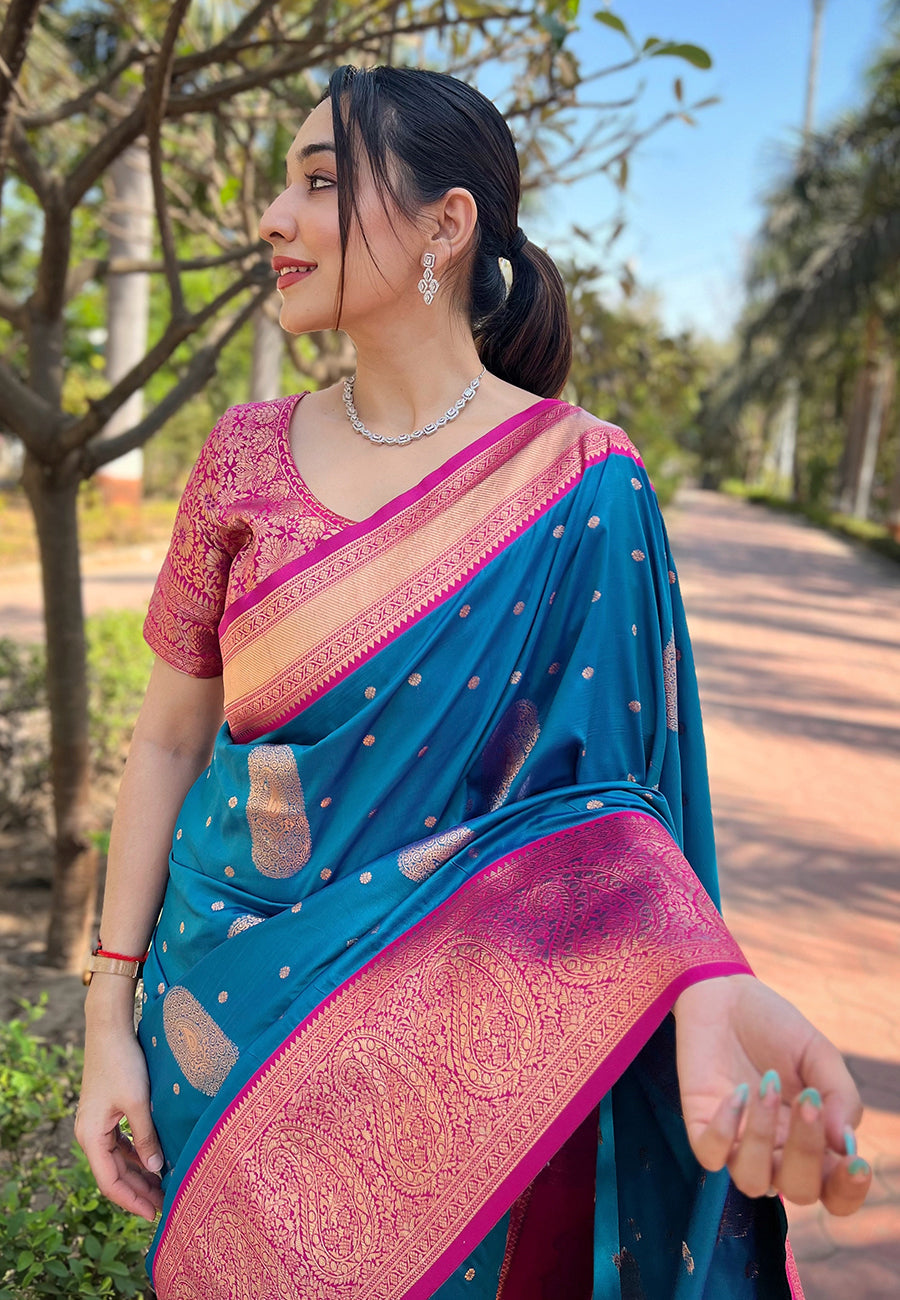 Peacock blue soft silk contrast gold zari woven saree