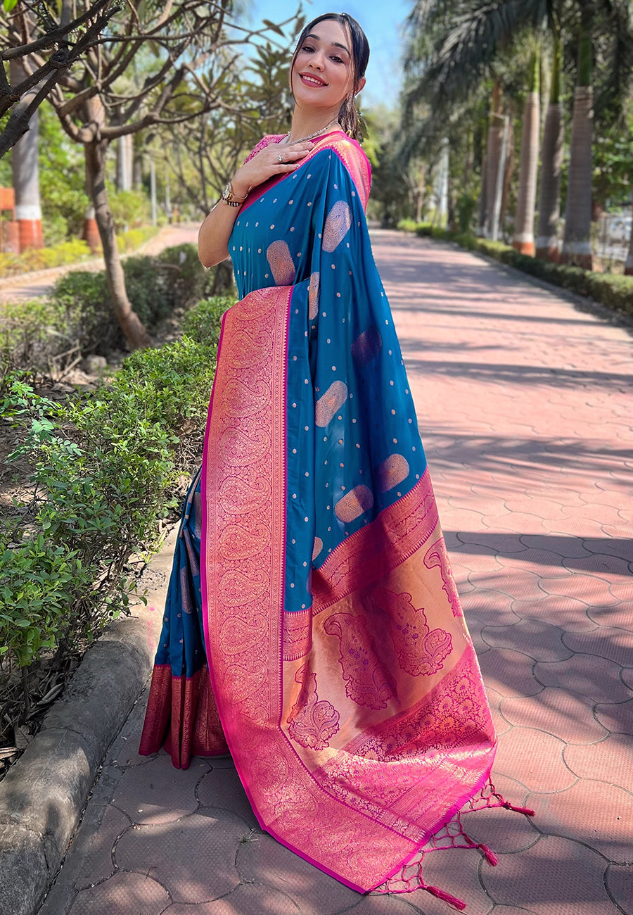 Peacock blue soft silk contrast gold zari woven saree