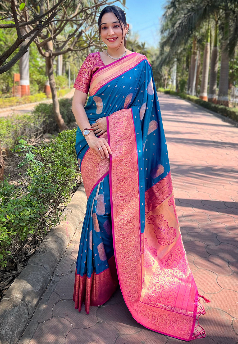 Peacock blue soft silk contrast gold zari woven saree