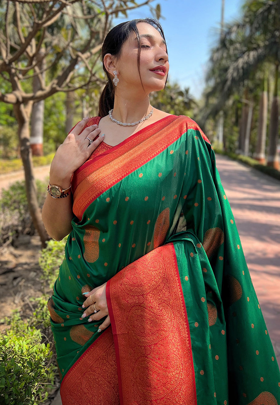 Green soft silk contrast gold zari woven saree
