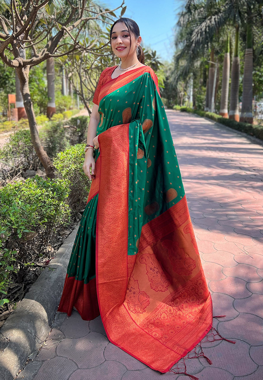 Green soft silk contrast gold zari woven saree