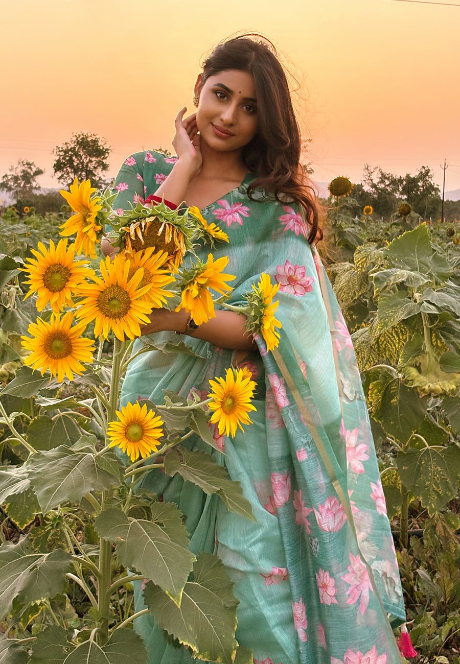 Monika in our sea green chanderi cotton pichwai printed saree with zari woven border