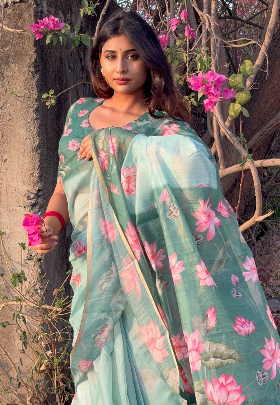 Monika in our sea green chanderi cotton pichwai printed saree with zari woven border