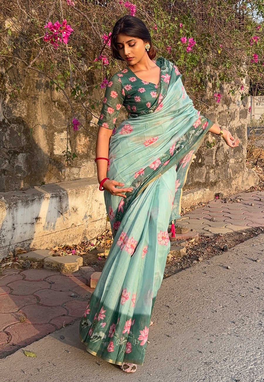 Monika in our sea green chanderi cotton pichwai printed saree with zari woven border