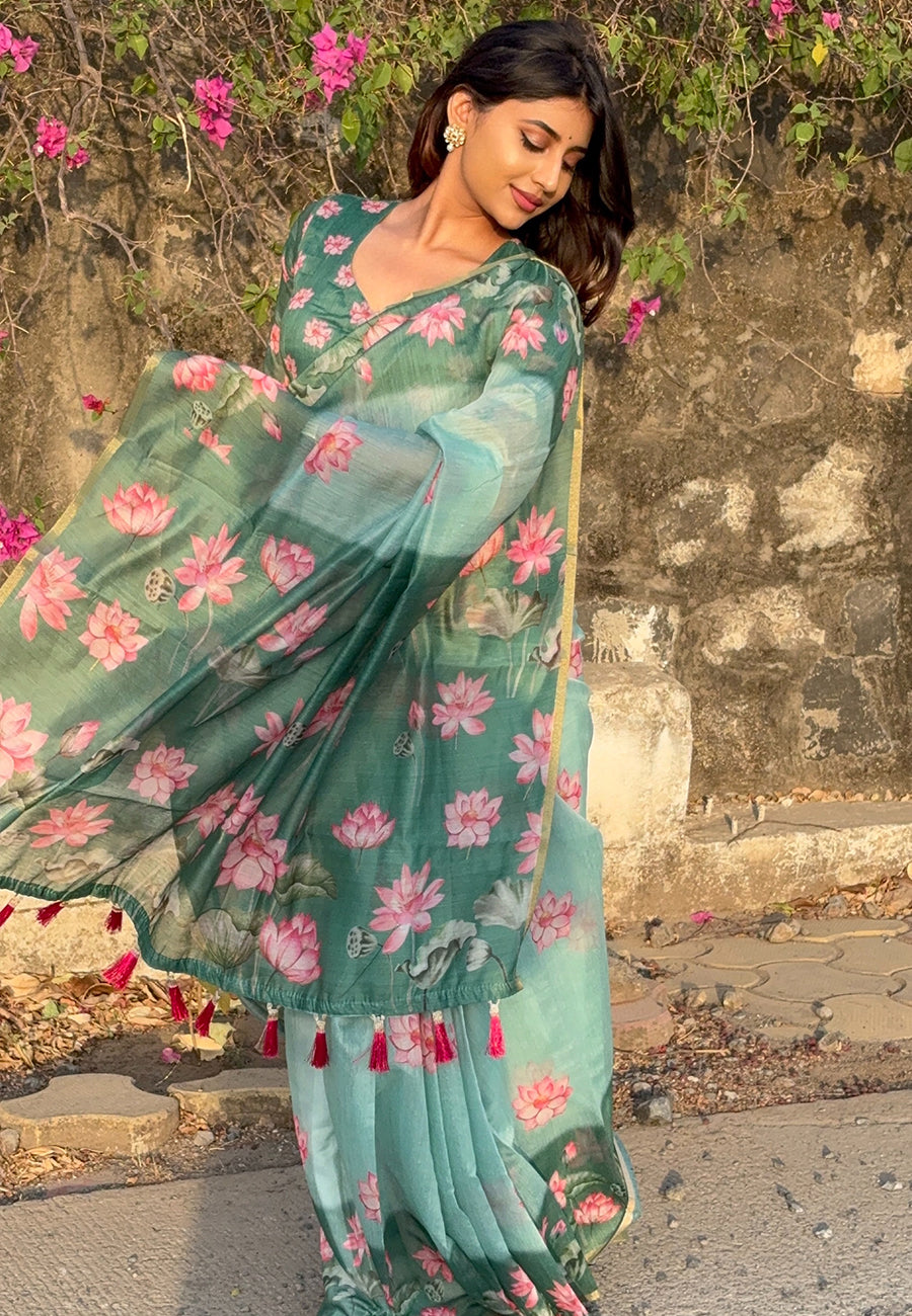 Monika in our sea green chanderi cotton pichwai printed saree with zari woven border