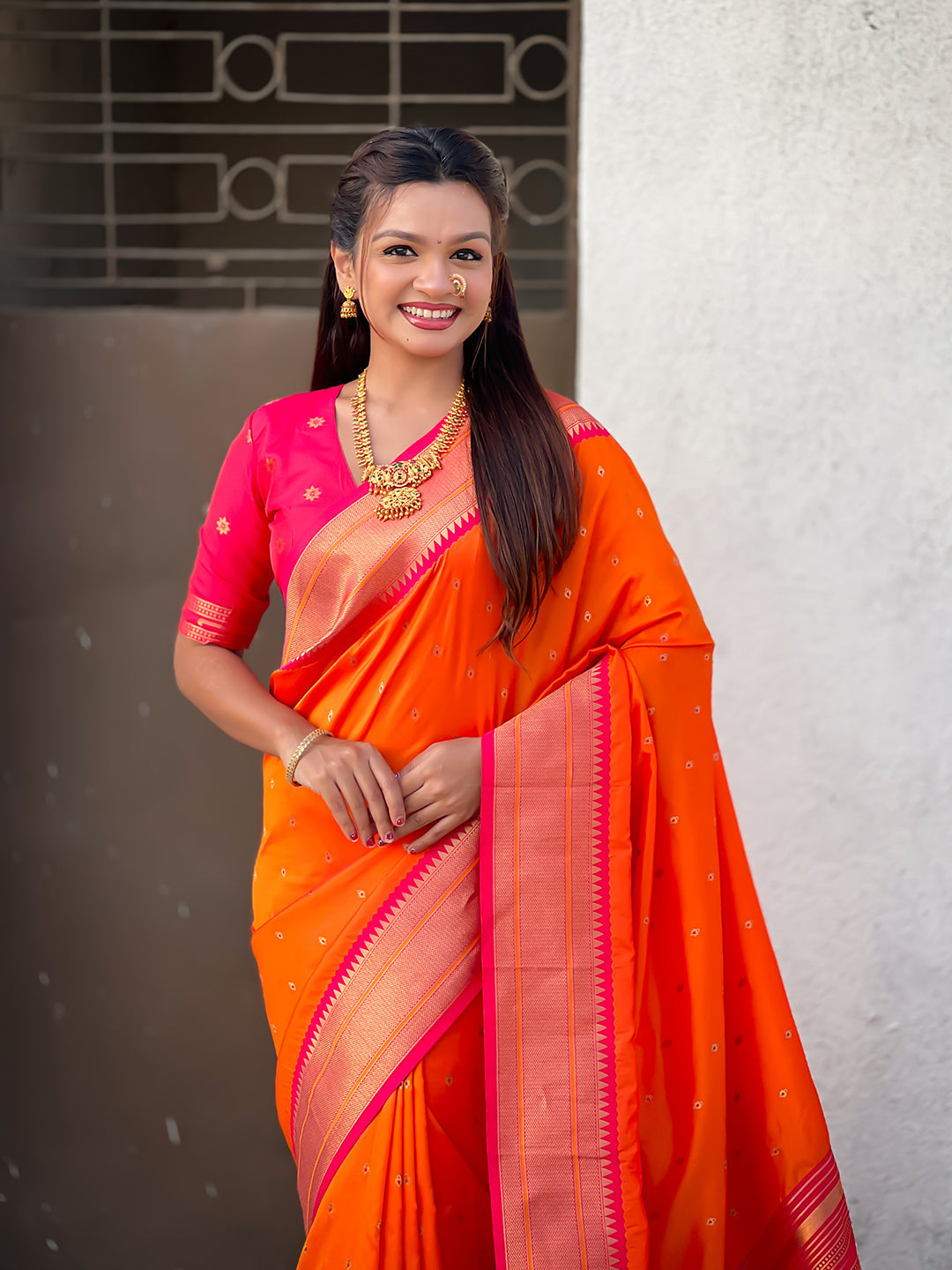 Orange soft silk paithani zari woven saree