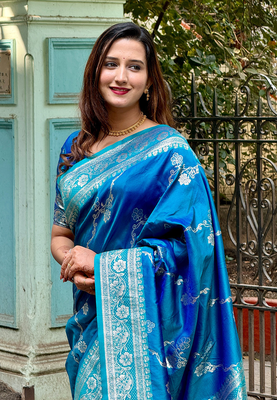 Blue banarasi jaal soft silk zari woven saree