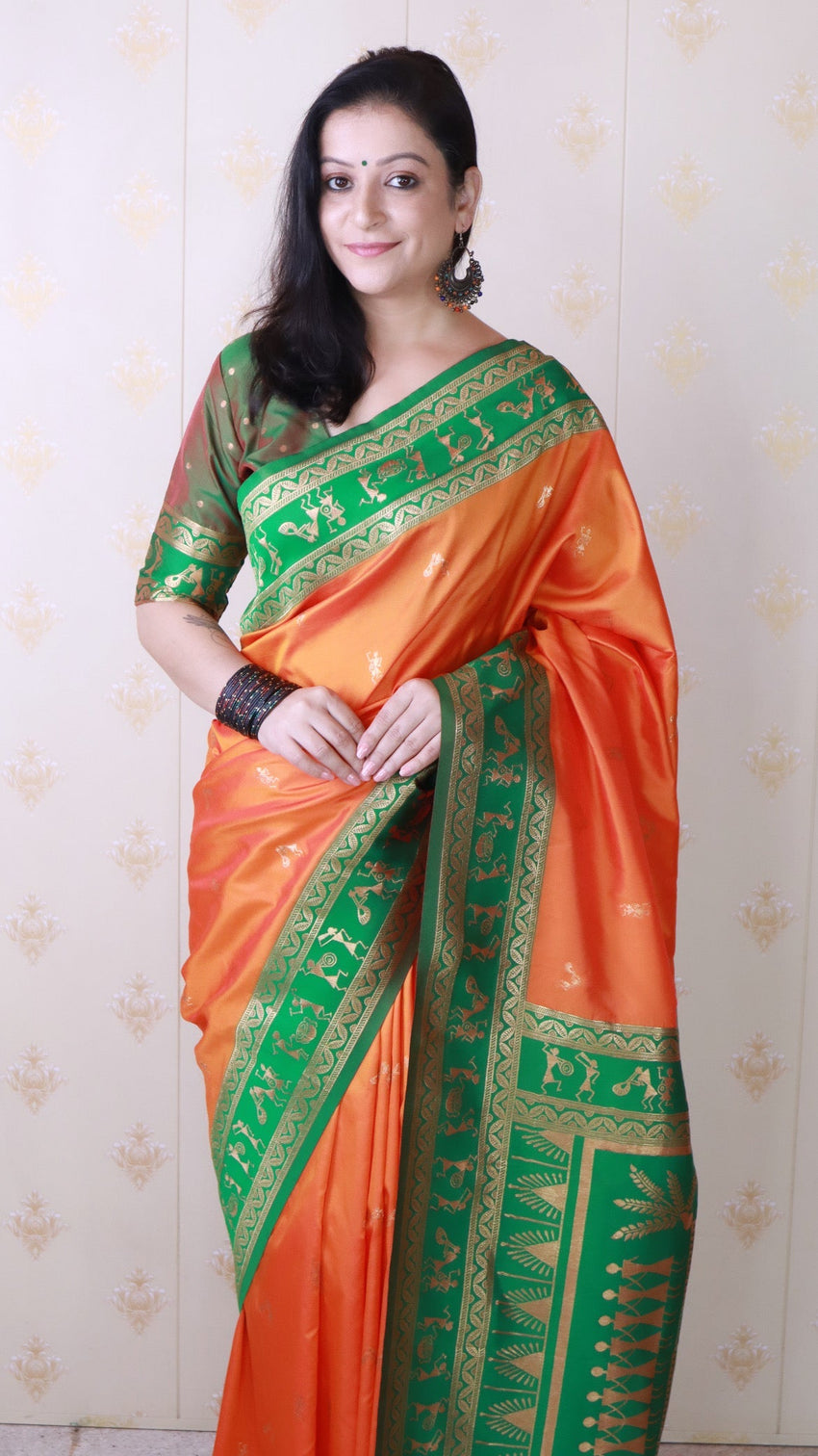 Orange soft silk zari woven warli art traditional saree