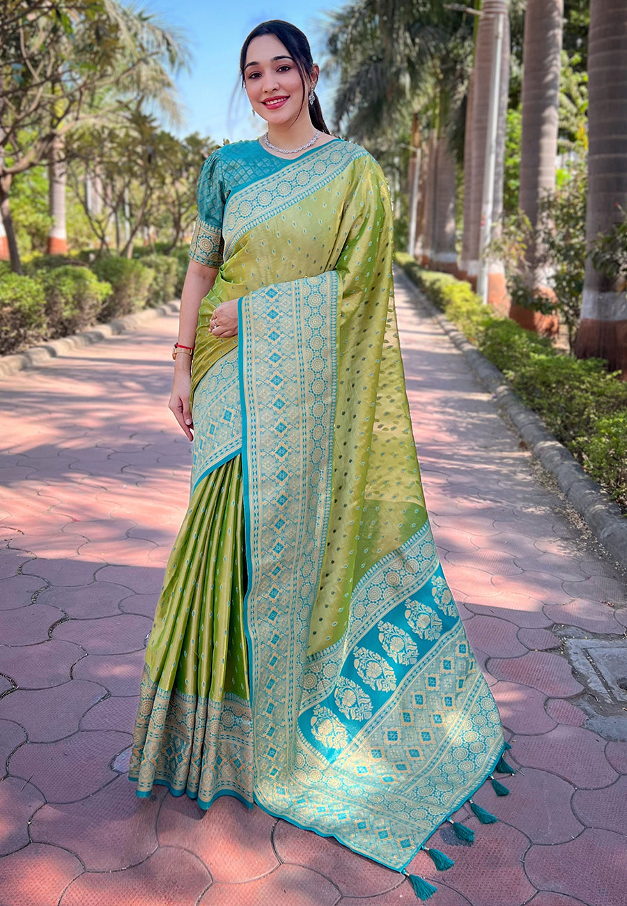 Green pure tissue zari woven saree with contrast weaves