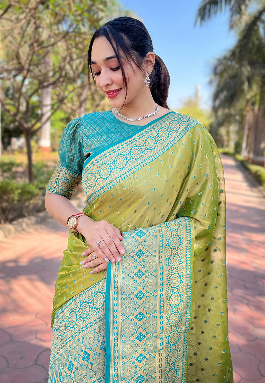 Green pure tissue zari woven saree with contrast weaves