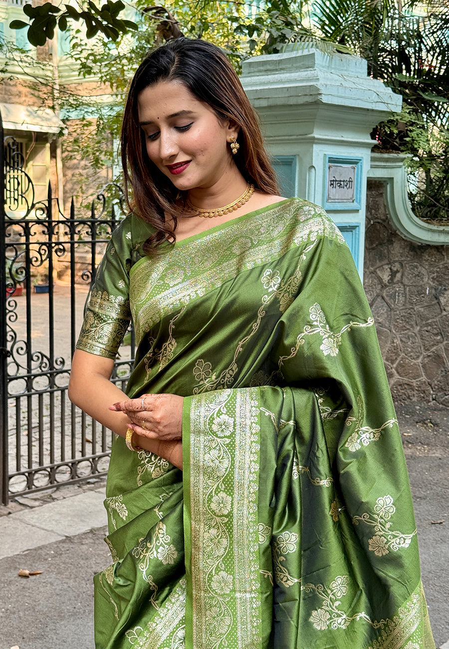 Mehendi green banarasi jaal soft silk zari woven saree