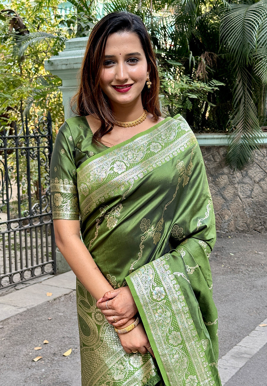 Mehendi green banarasi jaal soft silk zari woven saree