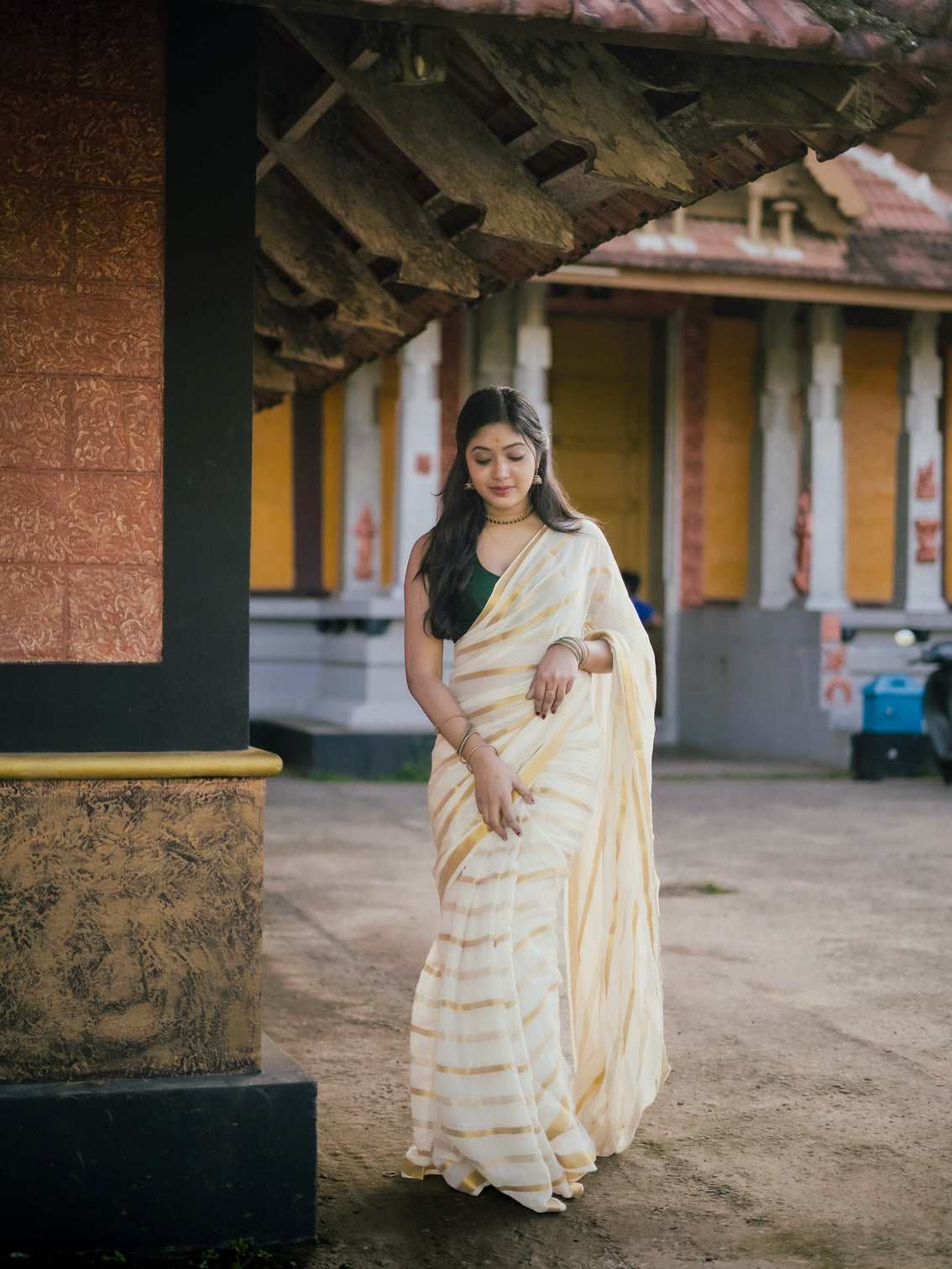 Ivory gold stripe kerala tissue saree traditional kasavu style elegant festive wear