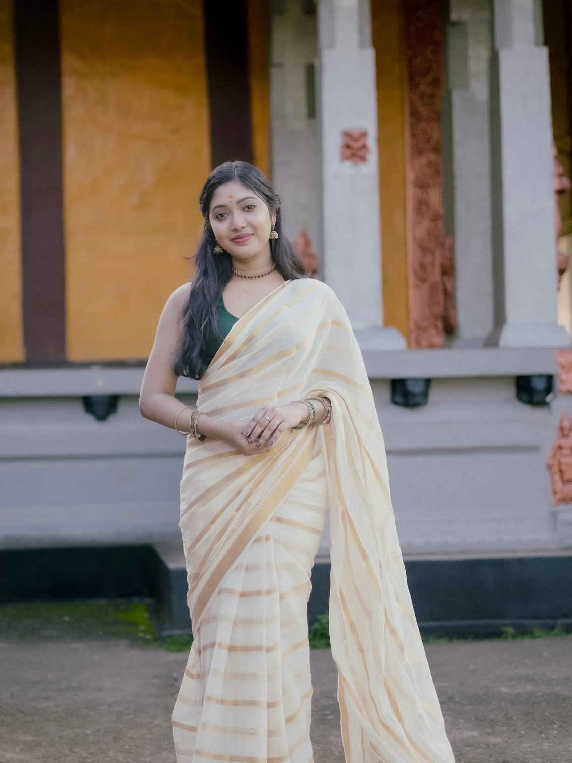 Ivory gold stripe kerala tissue saree traditional kasavu style elegant festive wear