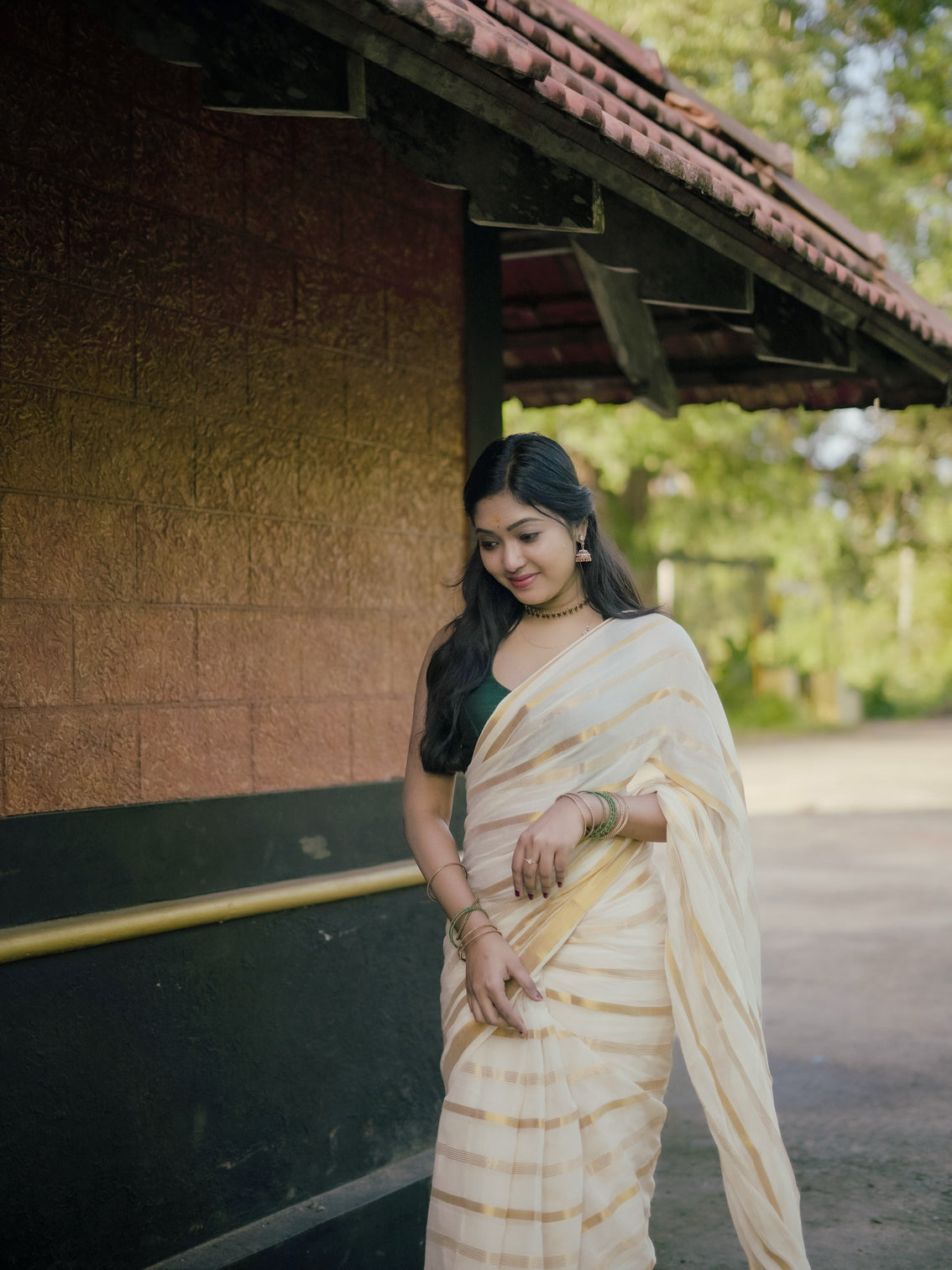 Ivory gold stripe kerala tissue saree traditional kasavu style elegant festive wear