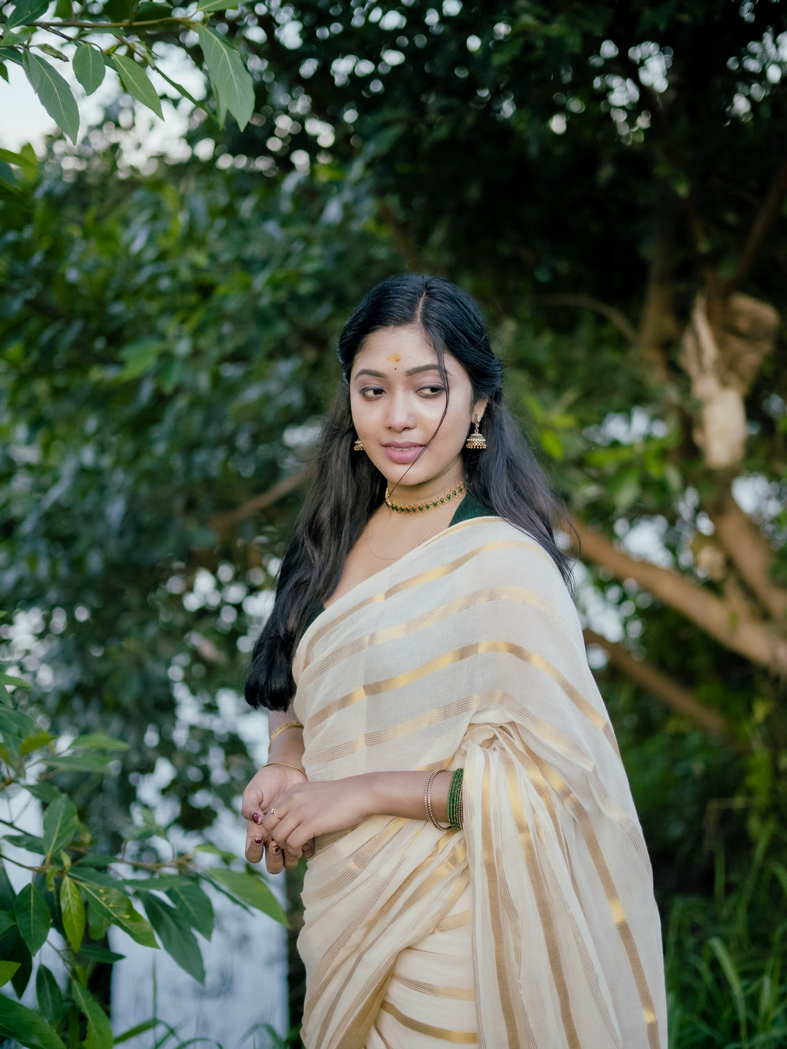 Ivory gold stripe kerala tissue saree traditional kasavu style elegant festive wear