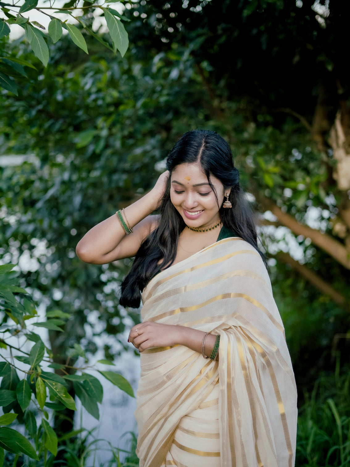 Ivory gold stripe kerala tissue saree traditional kasavu style elegant festive wear