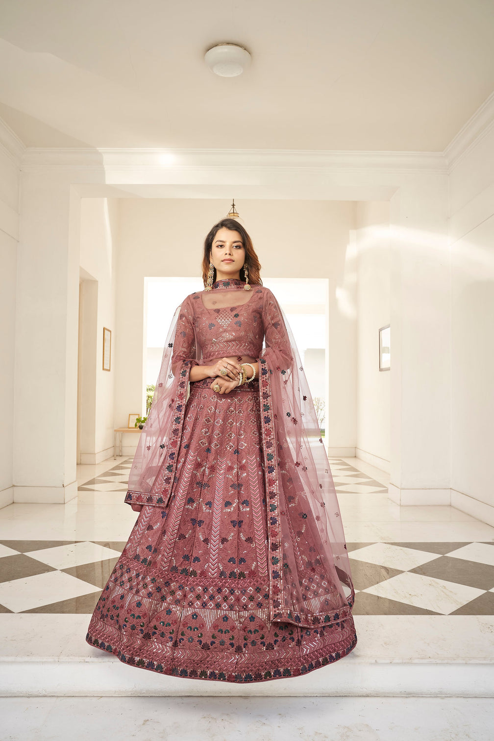 Invaluable Rust Orange Sequins Embroidered Silk Party Wear Lehenga Choli