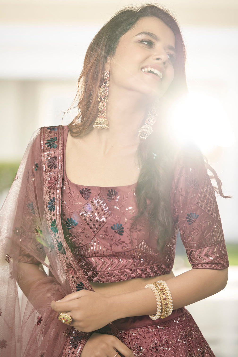 Invaluable Rust Orange Sequins Embroidered Silk Party Wear Lehenga Choli