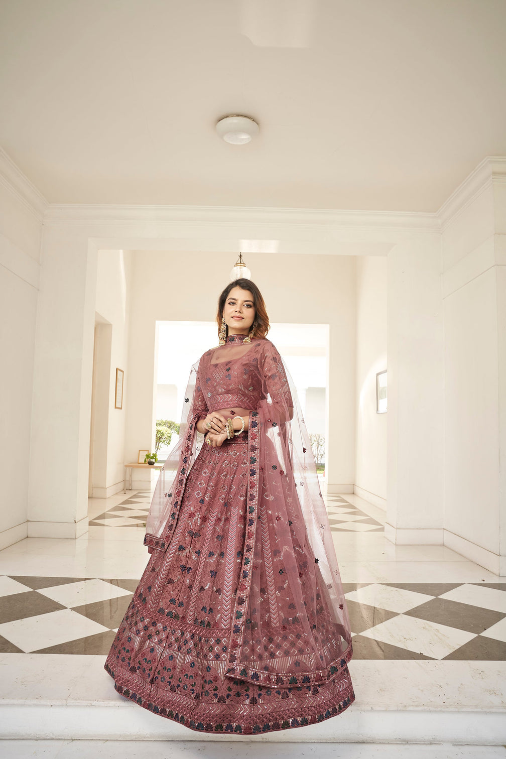 Invaluable Rust Orange Sequins Embroidered Silk Party Wear Lehenga Choli
