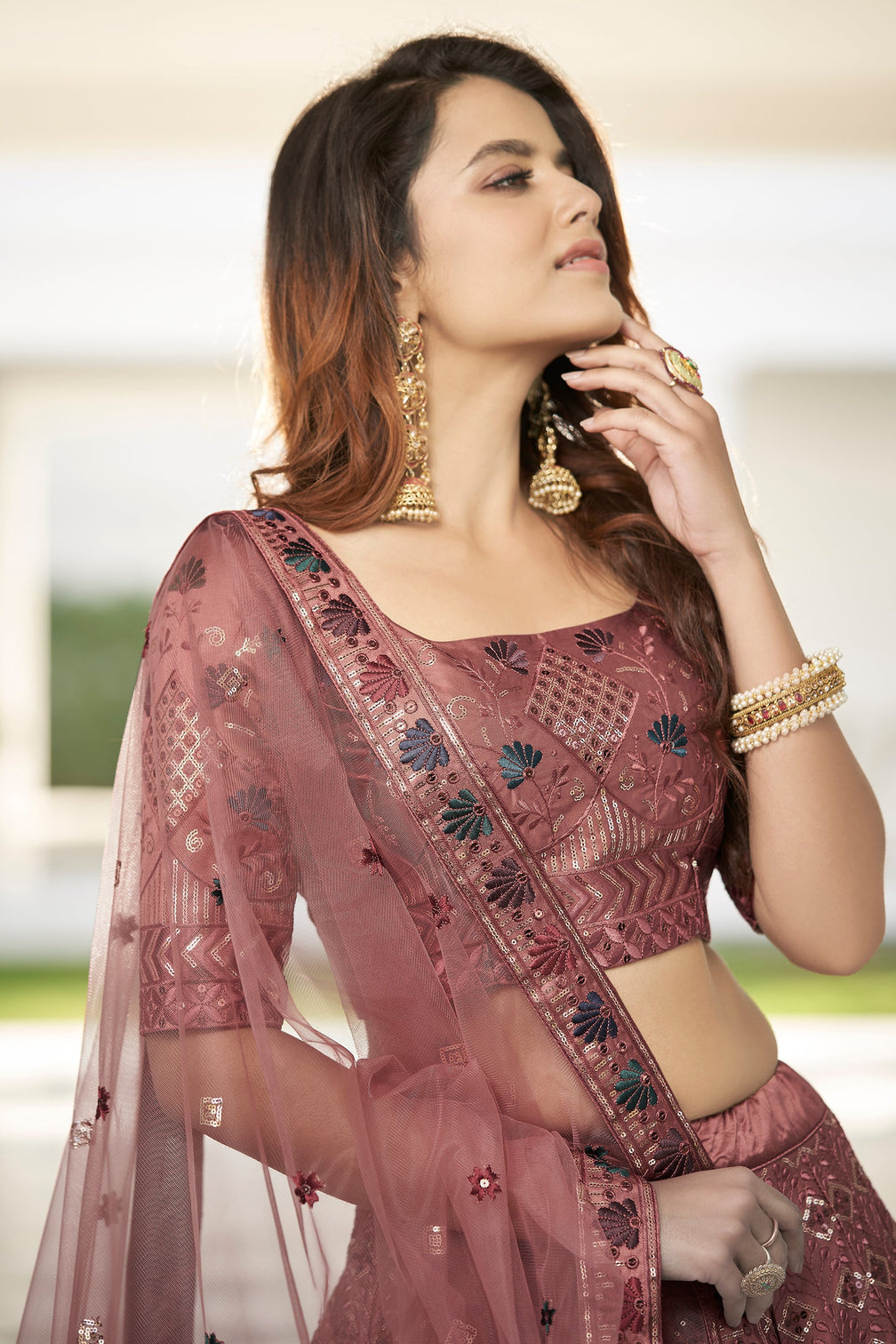 Invaluable Rust Orange Sequins Embroidered Silk Party Wear Lehenga Choli