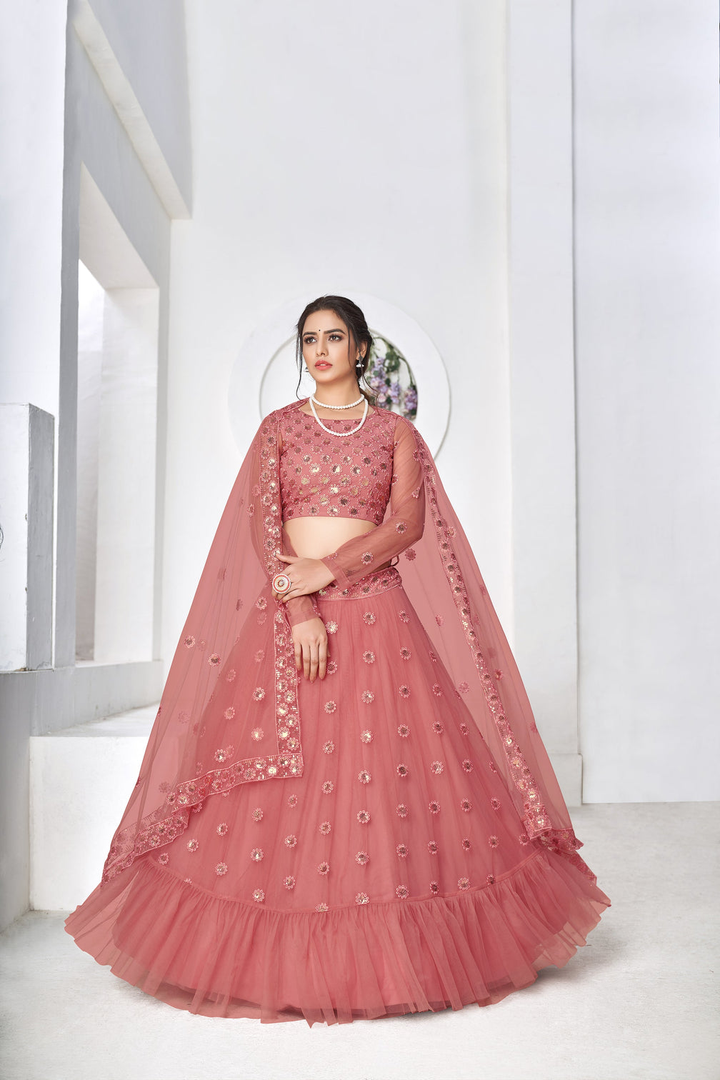 Irresistible Dusty Pink Thread With Sequins Embroidered Net Wedding Lehenga Choli