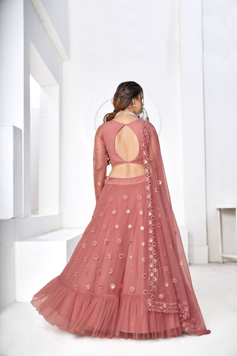 Irresistible Dusty Pink Thread With Sequins Embroidered Net Wedding Lehenga Choli