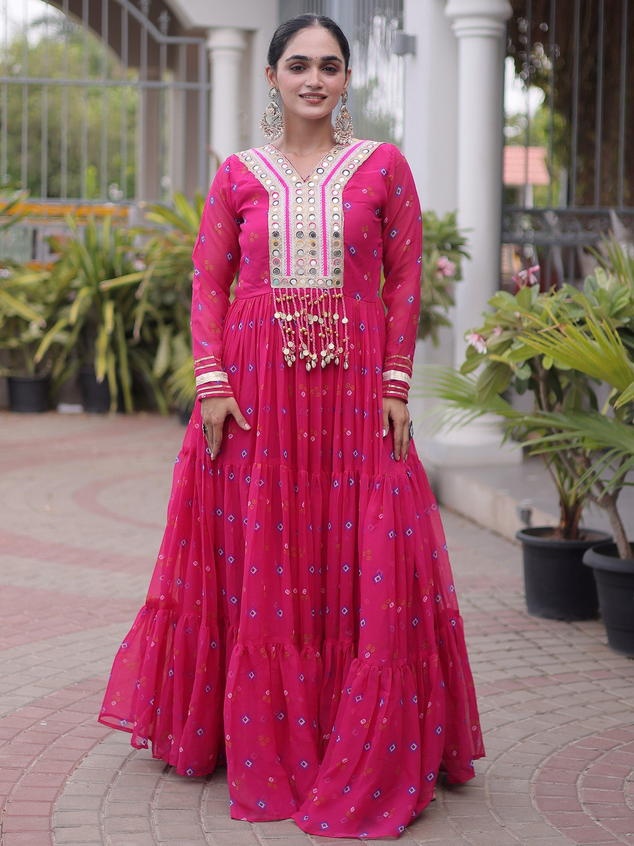 Outstanding Rani Pink Kutchi Patchwork Georgette Navratri Wear Gown