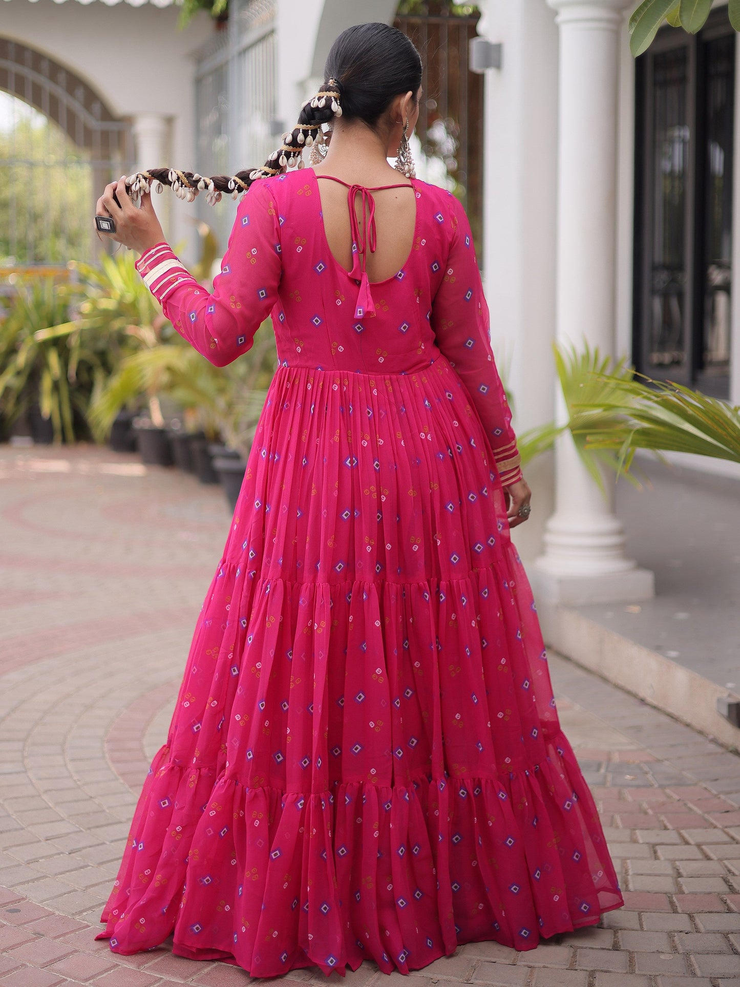 Outstanding Rani Pink Kutchi Patchwork Georgette Navratri Wear Gown