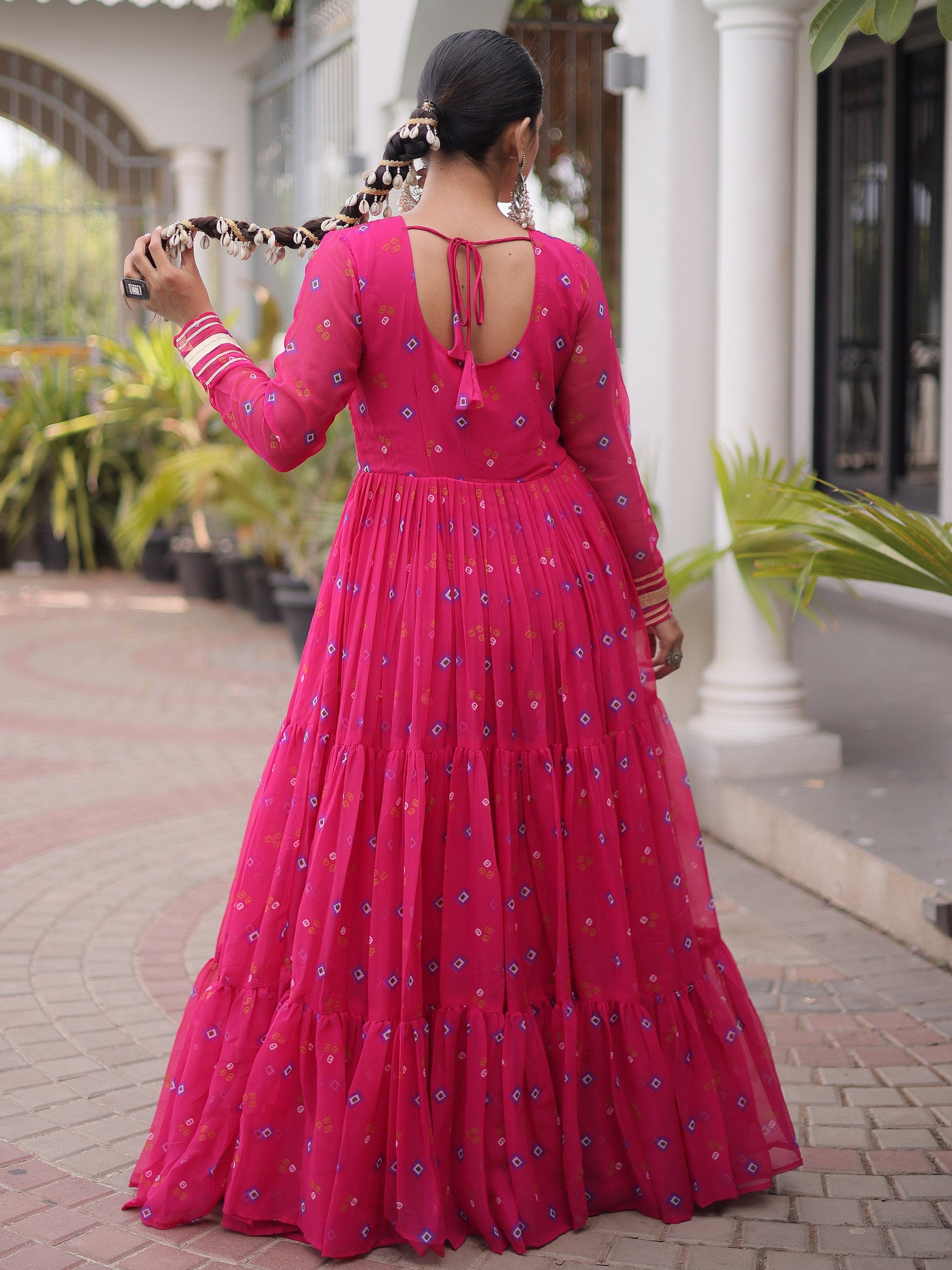 Outstanding Rani Pink Kutchi Patchwork Georgette Navratri Wear Gown