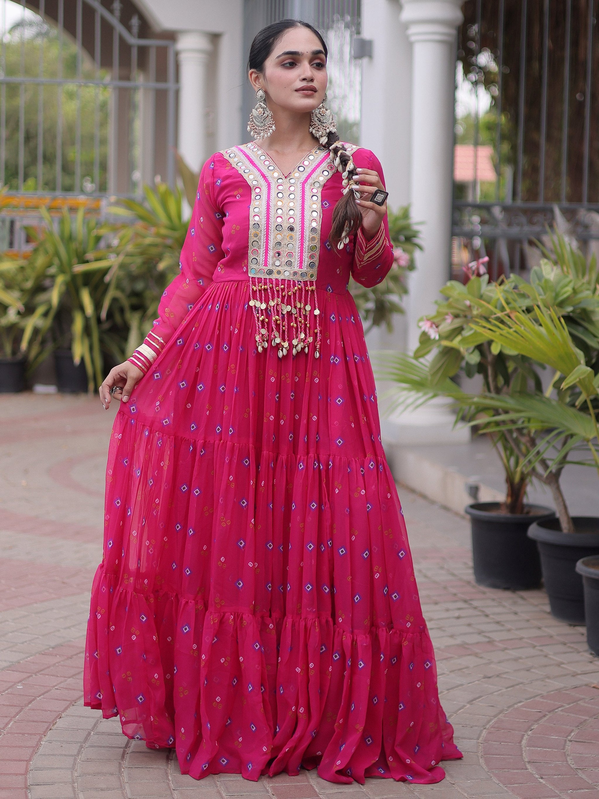 Outstanding Rani Pink Kutchi Patchwork Georgette Navratri Wear Gown