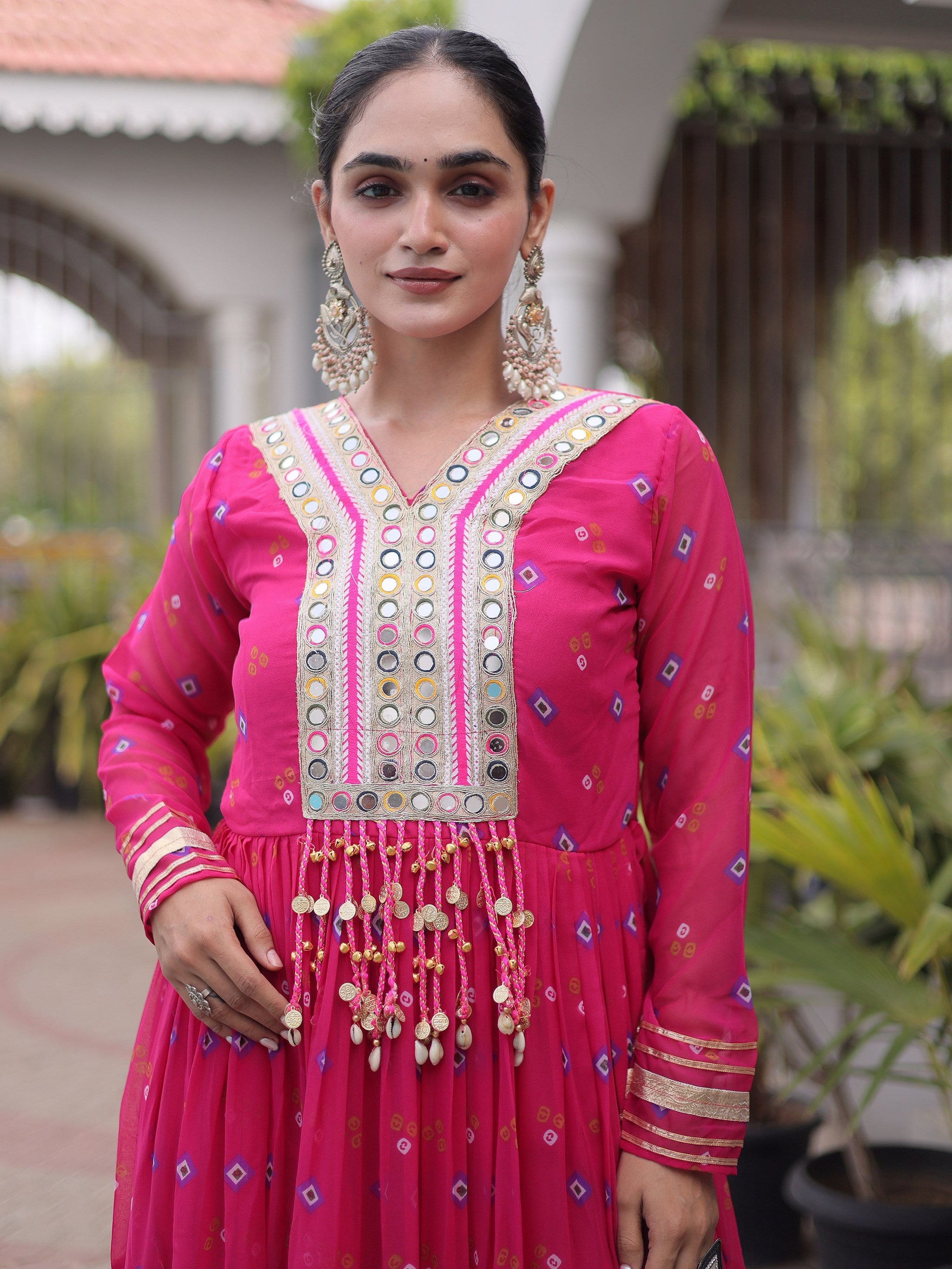 Outstanding Rani Pink Kutchi Patchwork Georgette Navratri Wear Gown