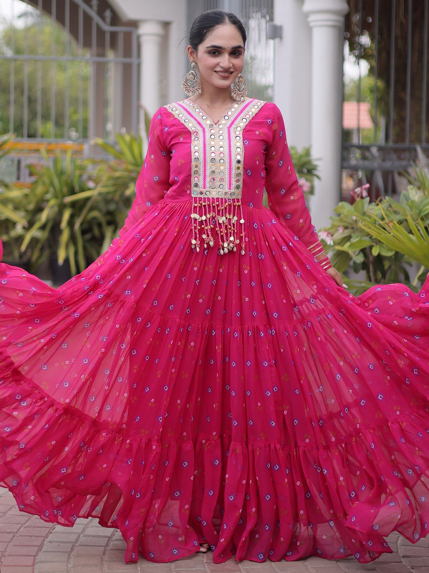 Outstanding Rani Pink Kutchi Patchwork Georgette Navratri Wear Gown
