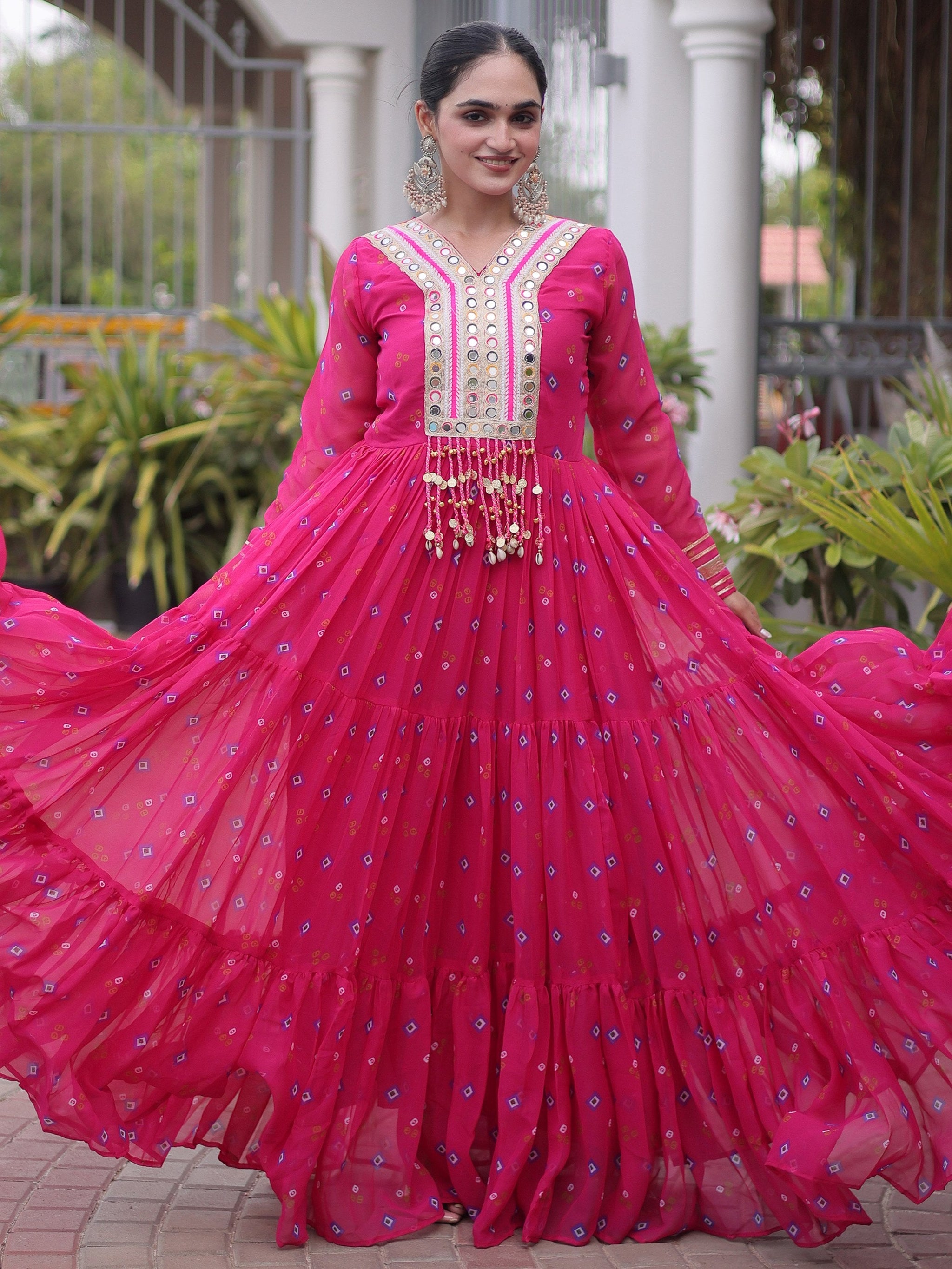 Outstanding Rani Pink Kutchi Patchwork Georgette Navratri Wear Gown