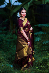 Snazzy Wine Soft Banarasi Silk Saree With Gratifying Blouse Piece