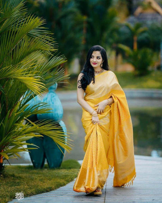Extraordinary Yellow Soft Banarasi Silk Saree With Sensational Blouse Piece
