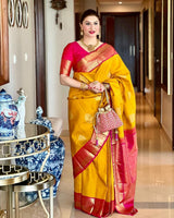Prominent Yellow Soft Banarasi Silk Saree With Blissful Blouse Piece