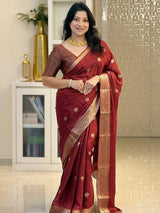 Intricate Maroon Soft Silk Saree With Confounding Blouse Piece