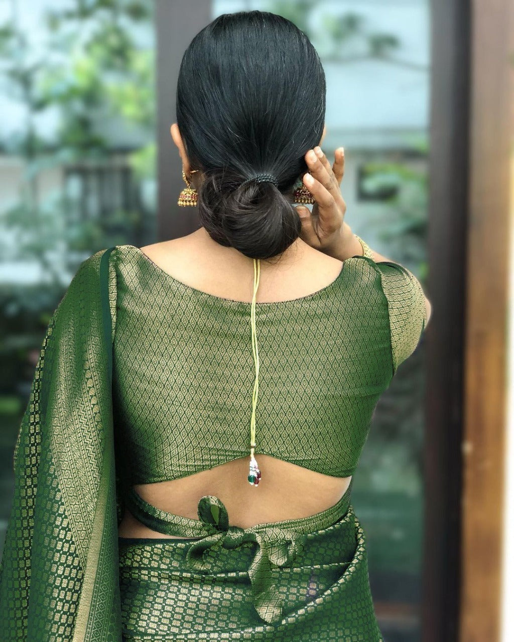 Flamboyant Green Soft Silk Saree With Gleaming Blouse Piece