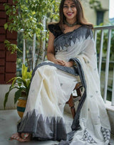 Flaunt Off White Cotton Silk Saree With Blooming Blouse Piece