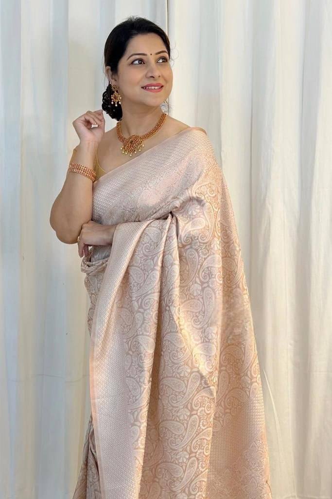 Cynosure Beige Soft Silk Saree With Glittering Blouse Piece