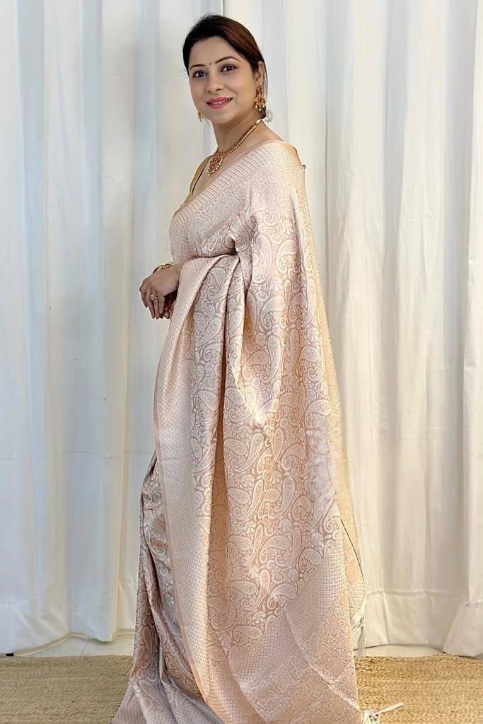 Cynosure Beige Soft Silk Saree With Glittering Blouse Piece