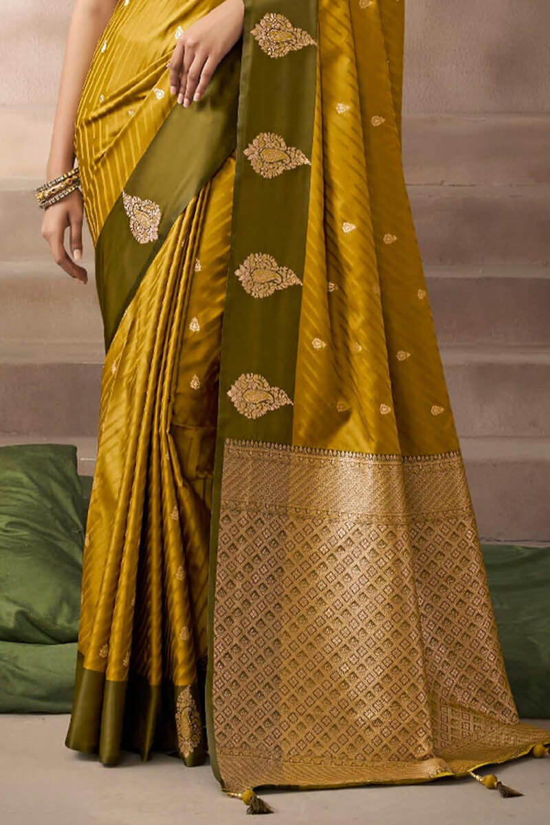 Cynosure Mustard Banarasi Satin Silk Saree With Imaginative Blouse