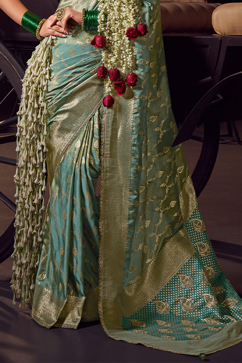 Blissful Sea Green Pure Viscose Tissue Banarasi Silk Saree With Glowing Blouse Piece