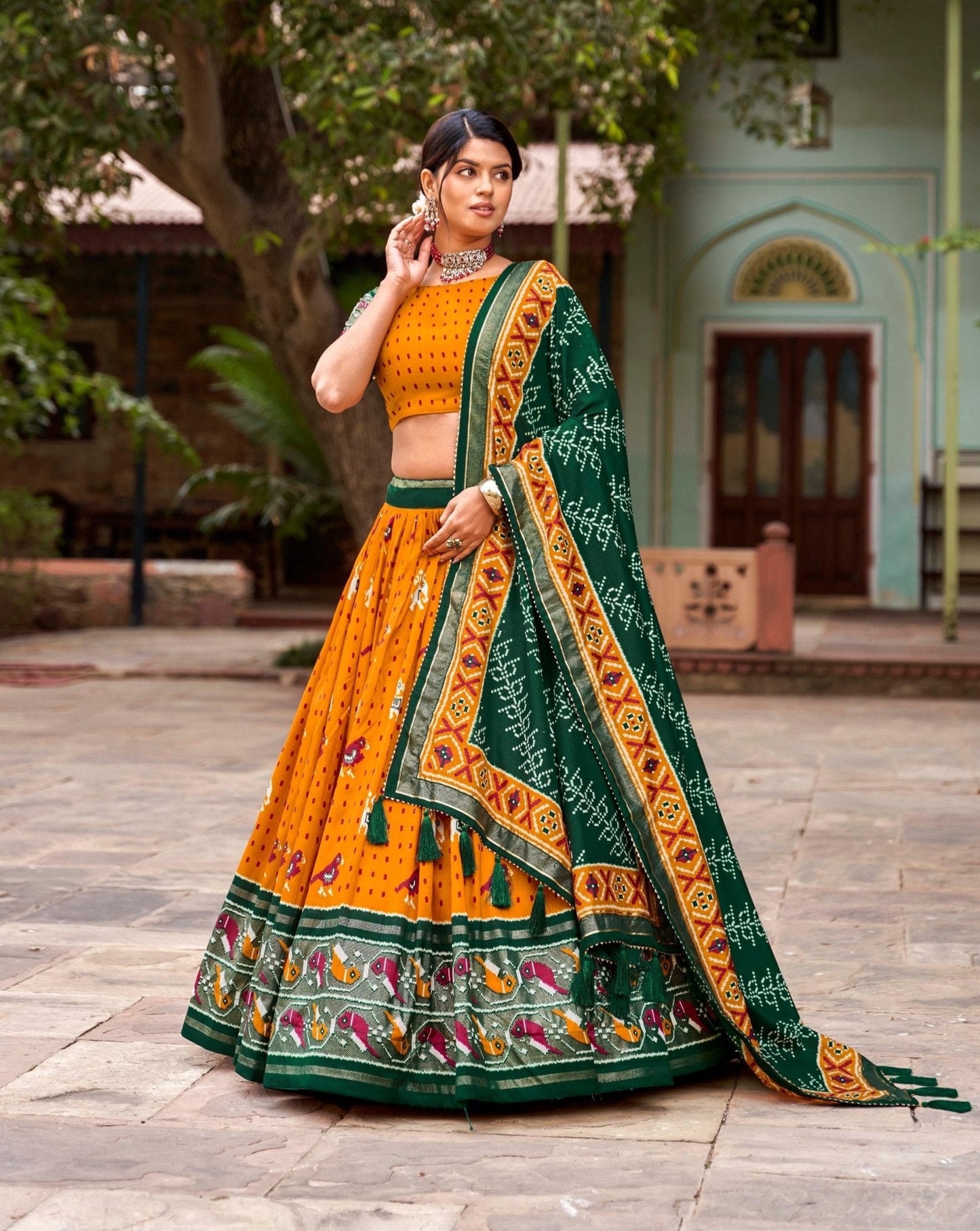 Mustard Colored Tussar Silk Patola Printed Festive Wear Lehenga Choli