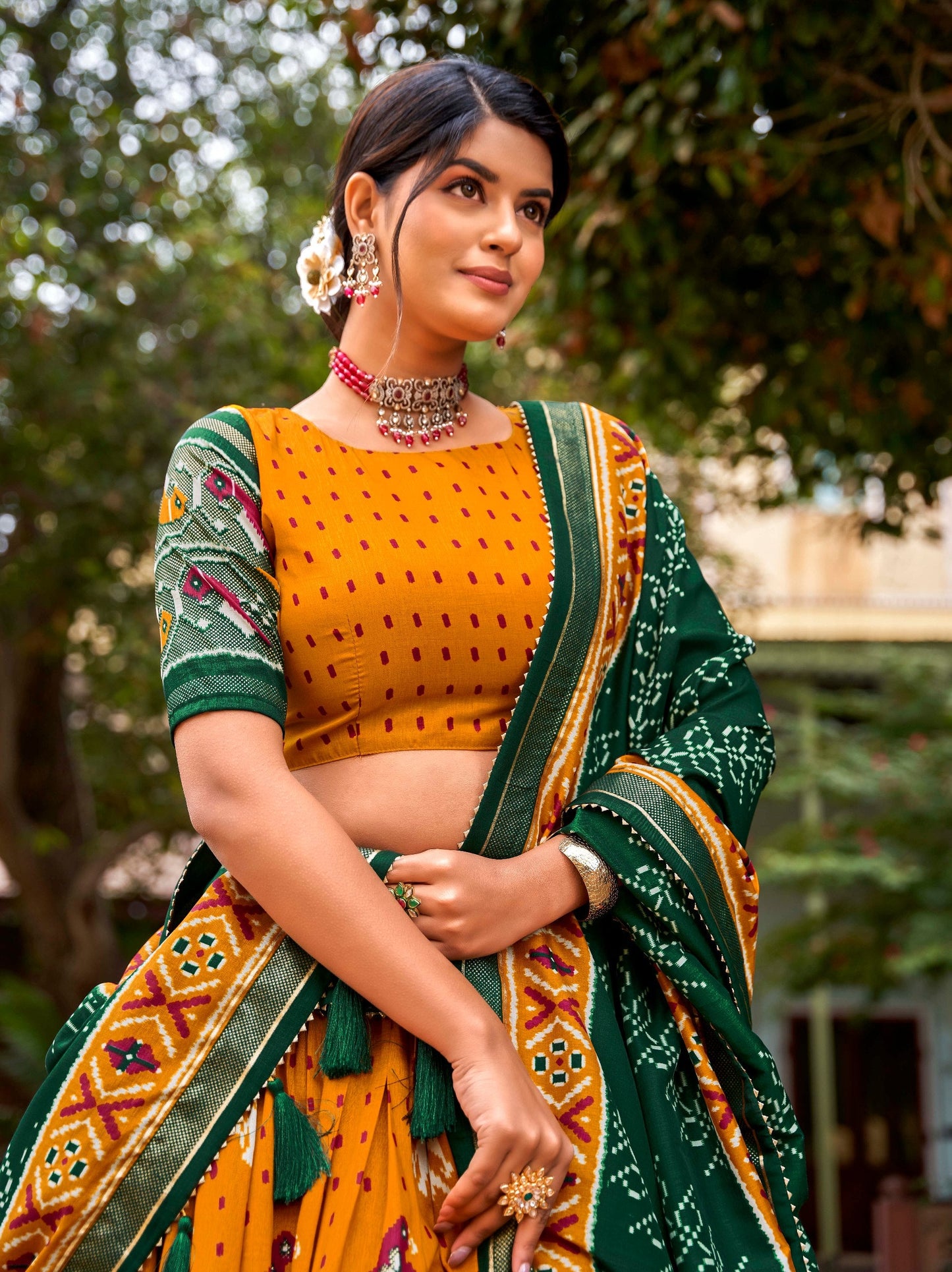 Mustard Colored Tussar Silk Patola Printed Festive Wear Lehenga Choli