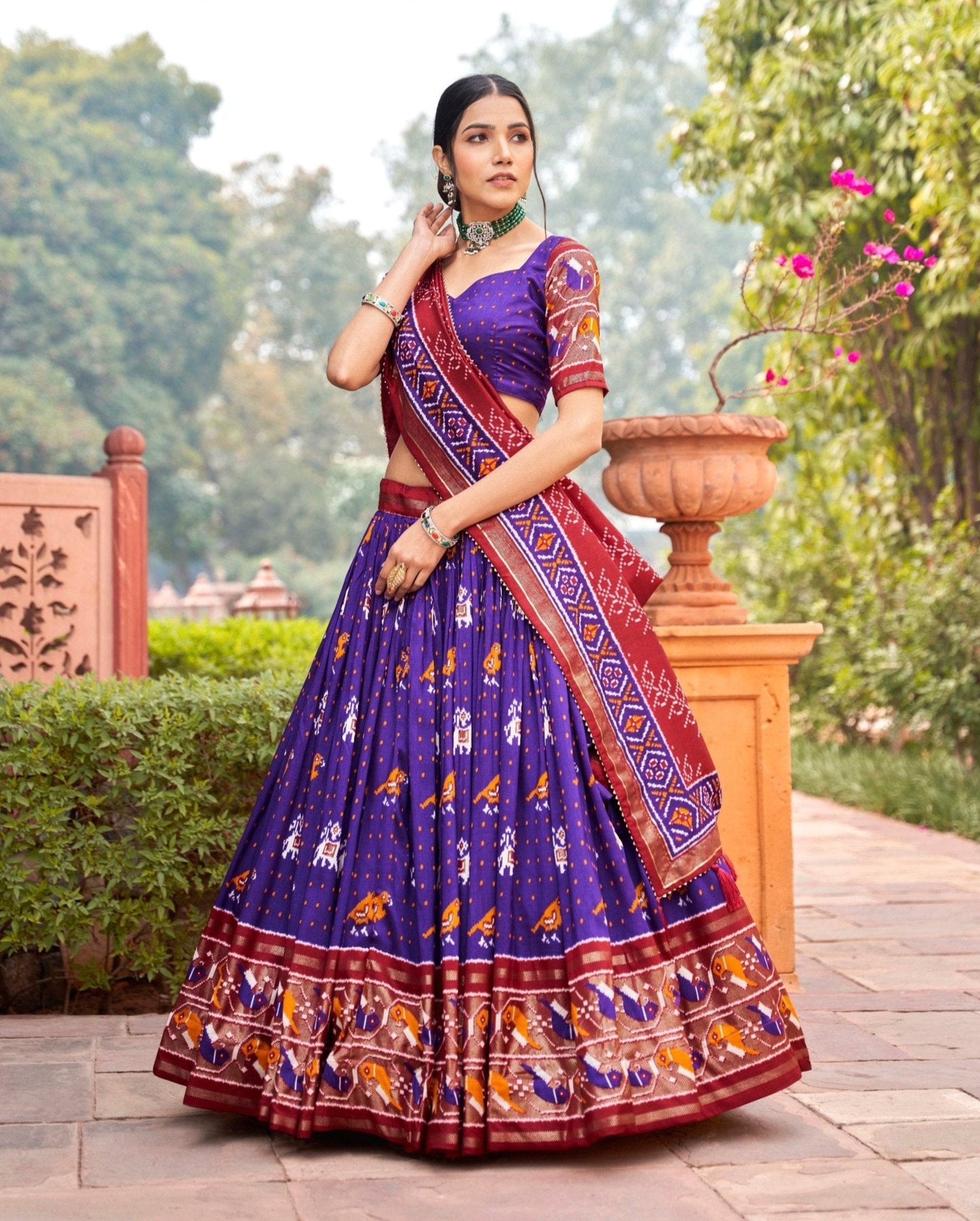 Amazing Purple Colored Tussar Silk Patola Printed Lehenga Choli