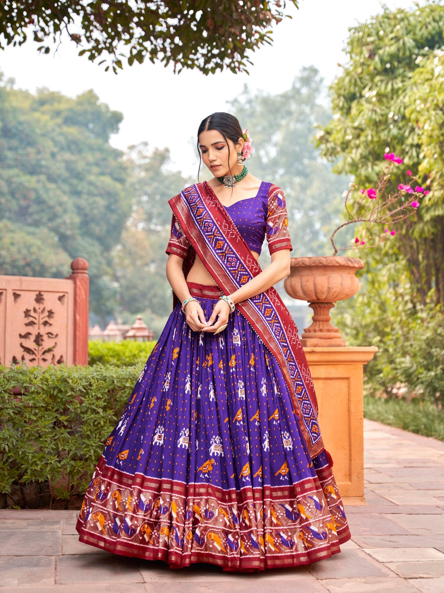 Amazing Purple Colored Tussar Silk Patola Printed Lehenga Choli