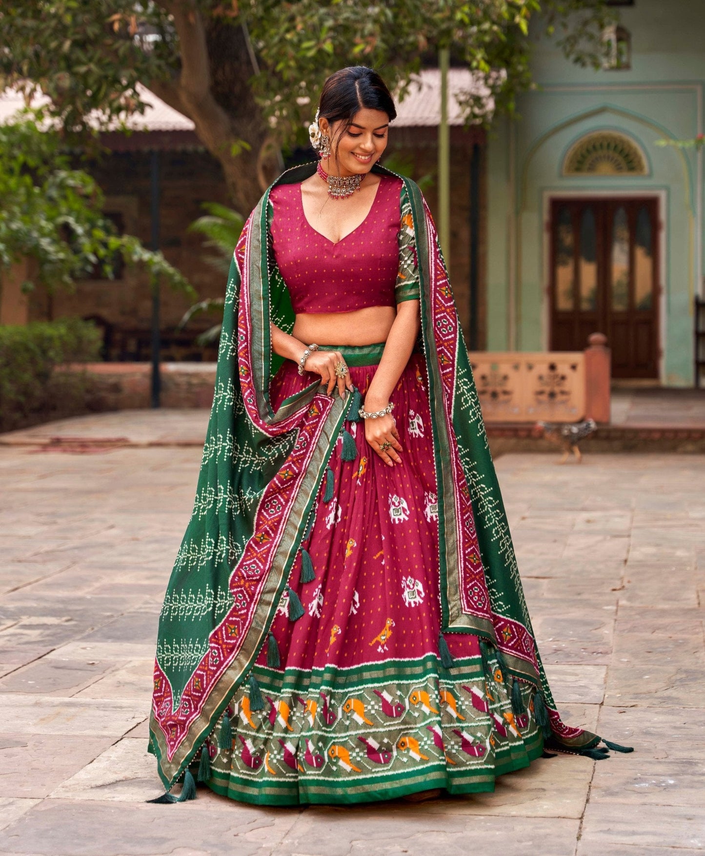 Dazzling Red Tussar Silk Patola Printed Foil Worked Lehenga Choli