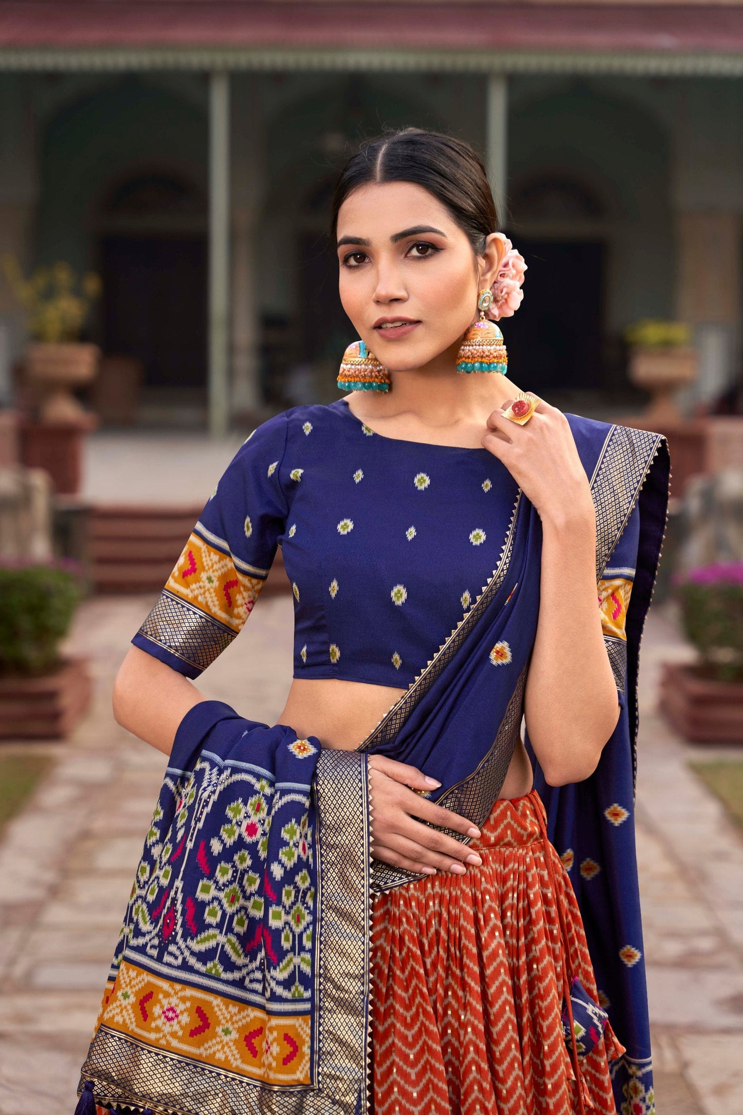 Incredible Orange Tussar Silk Patola Printed Lehenga Choli